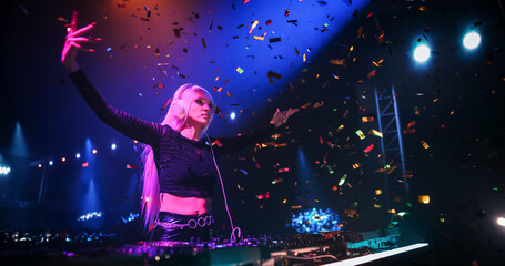 DJ Mixing Hit Songs on Mixing Decks. Empowering Young Music Producer Performing a Live Concert,...