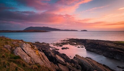 Sunset Over a Remote Rocky Shoreline, Captured Against the Background of Distant Islands and a Pink-Hued Sky for a Stunning Coastal Nature Landscape Scene