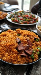 A vibrant bowl of jollof rice highlights a traditional meal, surrounded by fresh vegetables