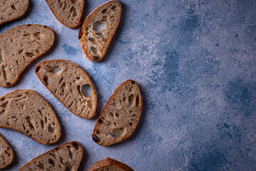 Sliced bread on blue backgrouns