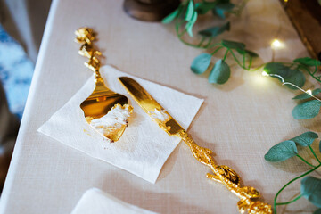 Elegant wedding cake utensils with frosting