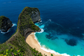 Nusa Penida. White sand beach with blue and aqua water. 