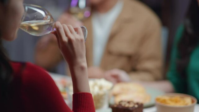 Friends join and celebrate the party with get cheers give a toast by clink glasses eating foods and drinks champagne. Happy and joyful in holiday weekend and festival.
