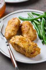 Portion of baked fried chicken