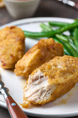 Portion of baked fried chicken