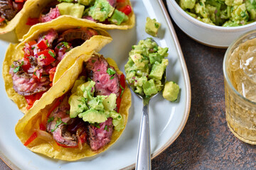 Skirt steak tacos with corn tortillas