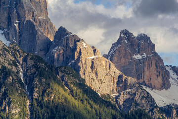 a breathtaking close view to the mountains of Rocca dei Baranci called Haunold in sunset near the...