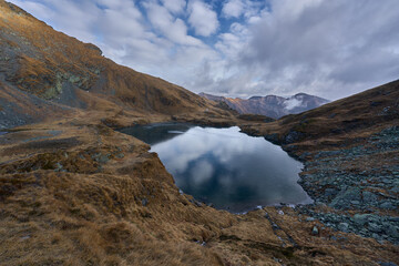 Frozen glacial lake in the mountains