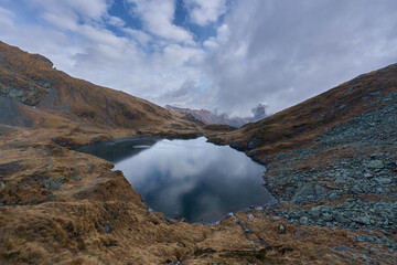 Frozen glacial lake in the mountains