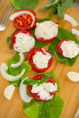 tomato wedges with cottage cheese filling and garlic, spicy appetizer
