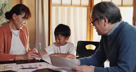 Grandparents, boy and teaching in home for learning, education and support with homework, paper or laugh. Grandma, grandpa and child for development, study and growth with school project in Japan - Powered by Adobe