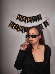 young woman with a glass of champagne