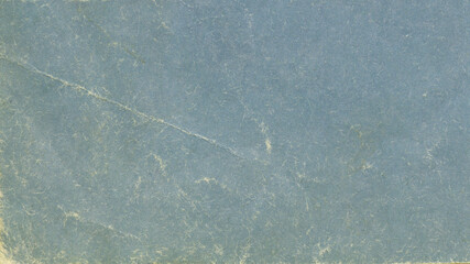 Old blue book cover background. Texture of vintage cardboard. 