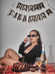 young woman with a bottle of wine