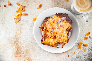 Brioche sweet almond french toast fresh tasty food dish delicious gourmet food background on the...