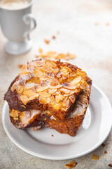 Brioche sweet almond french toast fresh tasty food dish delicious gourmet food background on the table rustic food top view copy space