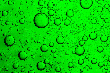 Green macro drink bubble texture,Macro bubble texture green,Close up macro Aloe vera gel serum cosmetic texture green background with bubbles. Cruelty free. Lemongrass gel skincare product. antibacter