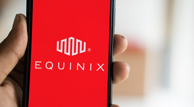 Dhaka, Bangladesh- 15 Oct 2024: Equinix logo is displayed on smartphone. Equi nix Inc is an American multinational company.