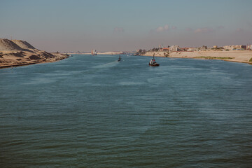 These captivating photos of the Suez Canal capture the essence of one of the world’s most vital waterways. They showcase various sites along the canal, including passing ships and desert landscapes © UnforgettableMoments