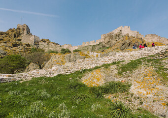 Old stone steps and walkway to the ruins of the Myrina Castle (Κάστρο Μύρινας) which overlooks Lemnos town and mountain ranges, Limnos, Greece, Aegean Seaside