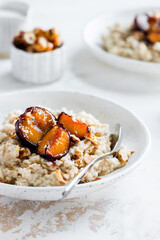Oatmeal with baked plums