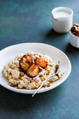 Oatmeal with baked plums