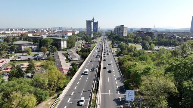 A Highway in Belgrade, with Belgrade Western Gate, the Brutalist Skyscrapper on Background. Aerial of Belgrade, Serbia