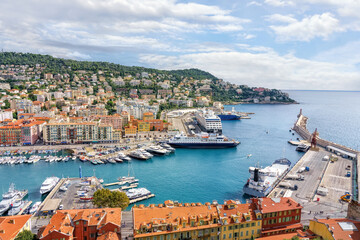 Nice, France. View of the old port of Nice, cruise liners, yachts and lighthouse, city on the hill....