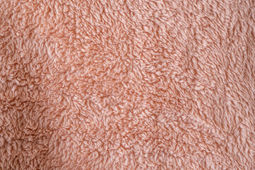 サーモンピンクのフリース生地