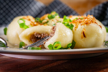 Potato dumplings with meat.