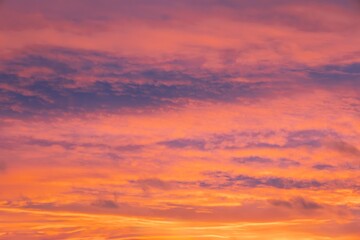 Majestic dusk. Sunset sky twilight in the evening with colorful sunlight. Pastel colors. Abstract nature background. Moody pink, purple clouds sunset sky with long shutter