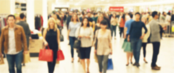 Blurred background of a Black Friday deals draw huge crowds to local department stores, black friday, shopping