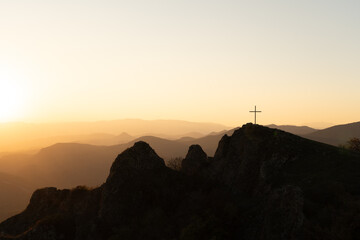 cross on top of mountain at sunset - photo wallpaper background , georgia