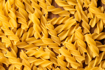 Sfondo di fusilli, pasta italiana, dieta mediterranea 