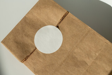 Blank Label on Brown Paper Bag on Table
