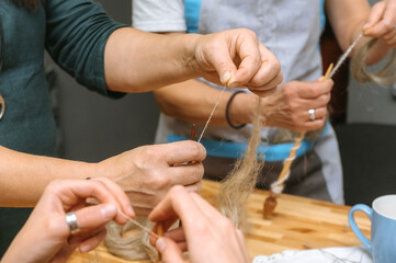 Distaff Day Traditional yarn spinning workshop with hands and handcrafted tools