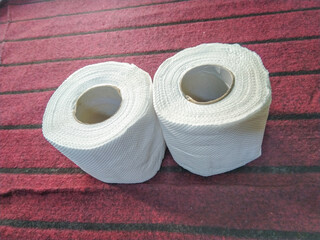 Essential Bathroom Toilet Paper Rolls ,Soft Toilet Paper Rolls on Red Background