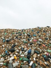 An overflowing landfill filled with plastic debris symbolizing environmental crisis, eco-friendly, concept, ecology