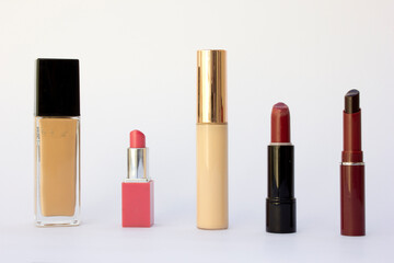 Elegant Lipstick Collection: A meticulously arranged collection of six lipstick tubes, each...