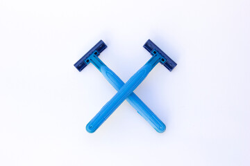 This blue shaving razor features a contemporary design with a comfortable grip, making it perfect for a smooth and effortless shaving experience. 