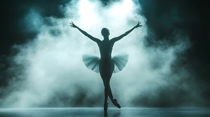 Naklejka premium Silhouette of a ballerina on stage in smoke and dramatic light