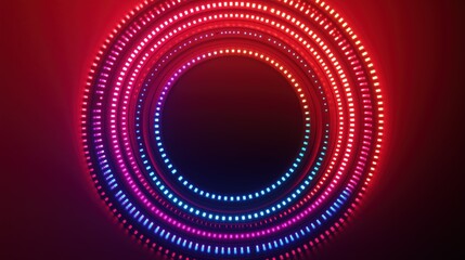 A vibrant circular pattern of gradient lights in red, orange, purple, and blue, radiating