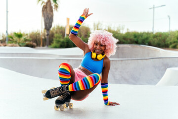 Beautiful woman skating with roller skates and having fun.