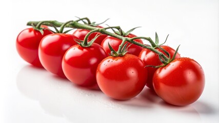 A row of red tomatoes with a stem on the top