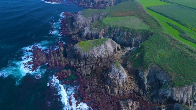 Aerial view from a drone of the coastal landscape and crops in the area around Cabo Cebes in Tapia de Casariego. Asturias. Spain. Europe