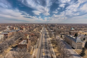 Fototapeta premium An aerial view of a city with a prominent clock tower