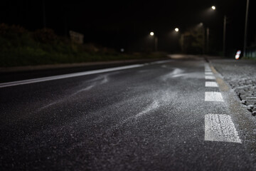 Road salt - Sprinkling salt on the road - against icing
