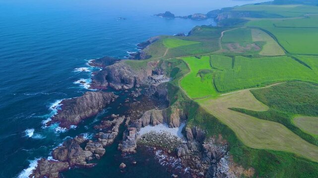Aerial view from a drone of the coastal landscape and crops in the area around Cabo Cebes in Tapia de Casariego. Asturias. Spain. Europe