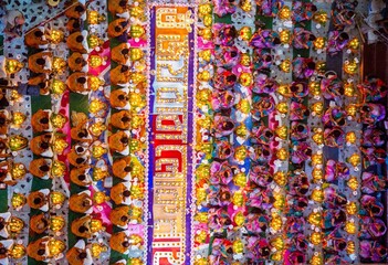 Bangladeshi Hindu devotees sit with candle light pray to God at Shri Shri Lokanath Brahmachari Ashram temple
during the religious festival Kartik Brati. Thousands of Hindu devotees sits with candles.