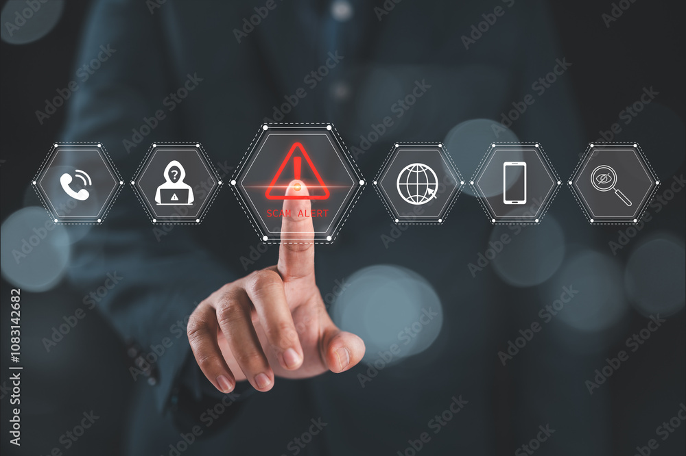 Leinwandbilder Cybersecurity scam alert warning concept. A hand interacts with a virtual interface displaying icons for scam alert, fraud detection, and online security, cybersecurity awareness and fraud prevention.